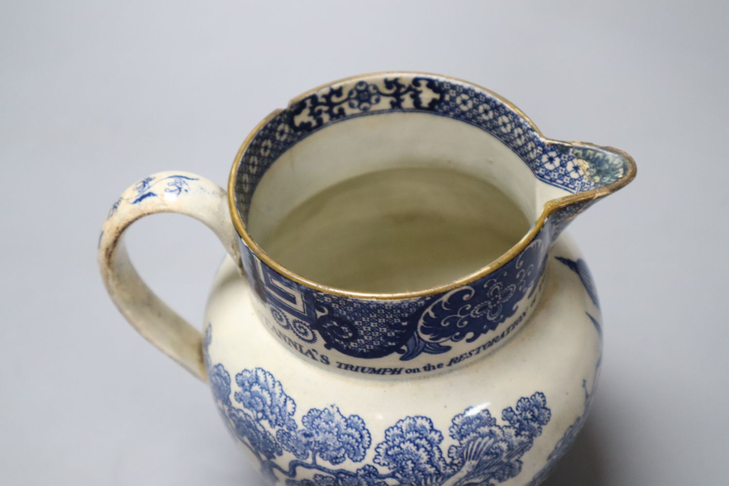 A rare pearlware jug commemorating the Peace of Amiens, c.1802, probably Swansea Pottery, 17cm